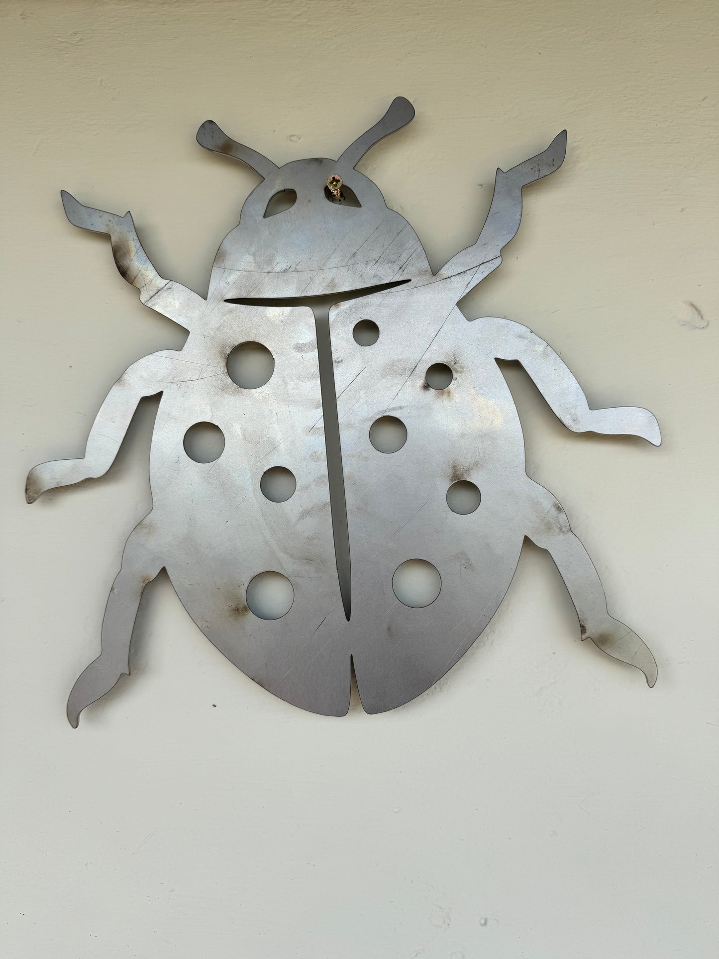 Ladybird metal garden wall art